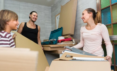 Removal team planning a house move on a Notting Hill street
