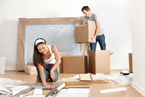 Man And A Van Nottinghill team safely loading furniture with protective equipment