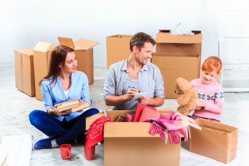 Professional movers handling a moving truck in Notting Hill neighborhood