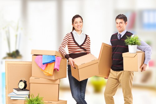 Flat removals planning in Notting Hill with packed boxes and moving checklist
