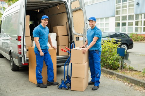 Customer confirming booking details for a man with a van service