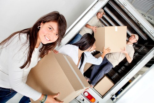 Commercial removals team loading office furniture in Notting Hill