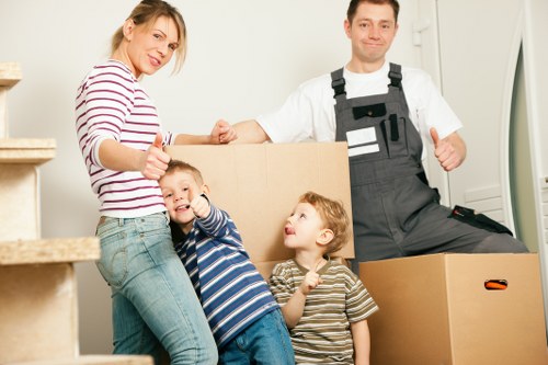Nottinghill moving team packing boxes and protecting fragile household items